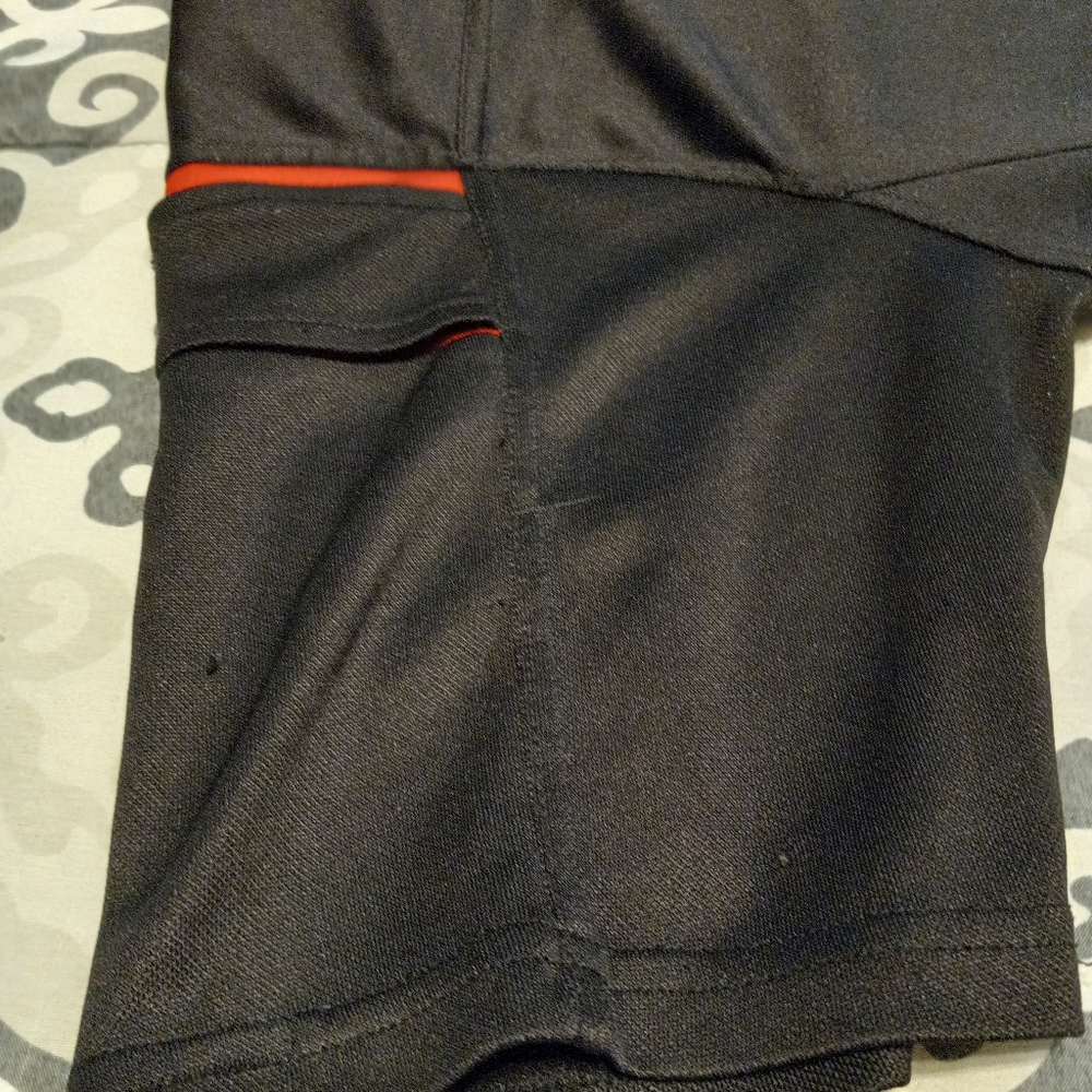 Four American Exchange Men's collar shirts. Two with zippers. Size Medium.